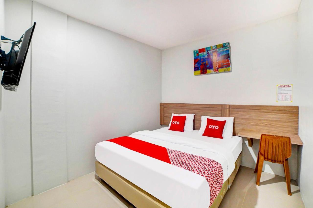 Oyo 91211 Mega Comfort Guest House Medan Eksteriør billede